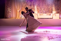Lovely Indian couple enjoying their first dance capture. Lovely Indian couple enjoying their first dance capture.