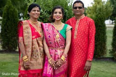 Indian bride with relatives outdoors capture. Indian bride with relatives outdoors capture.