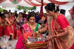 Indian bride getting gifts at her pre-wedding party. Indian bride getting gifts at her pre-wedding party.