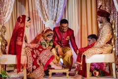 Indian bride getting her feet clean ritual. Indian bride getting her feet clean ritual.