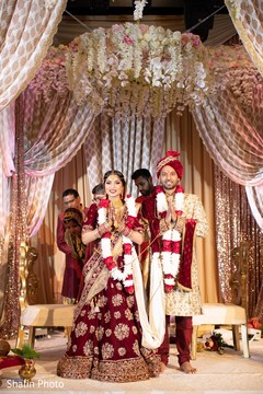Indian bride and groom at their Jaimala Ceremony. Indian bride and groom at their Jaimala Ceremony.