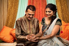 Beautiful indian bride showing henna art Beautiful indian bride showing henna art