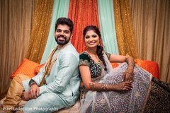 Ravishing indian bride and groom sangeet outfit