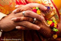Cute indian bride and groom holding hands Cute indian bride and groom holding hands