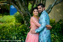 Lovely capture of Indian bride and groom holding each other Lovely capture of Indian bride and groom holding each other