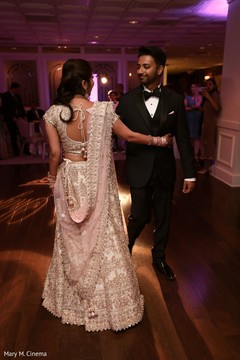 Indian lovebirds having their first dance Indian lovebirds having their first dance