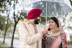 Adorable Indian couple under the rain. Adorable Indian couple under the rain.
