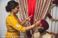 Indian groom almost ready for the great ceremony. Indian groom almost ready for the great ceremony.
