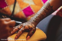 Magnificent mehndi art getting done. Magnificent mehndi art getting done.