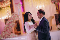 Cute indian bride dancing with her father. Cute indian bride dancing with her father.