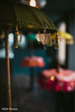 Elegant Sangeet table umbrella decoration. Elegant Sangeet table umbrella decoration.