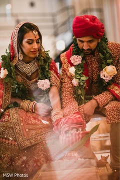Wonderful Indian couple with hands tied at ceremony. Wonderful Indian couple with hands tied at ceremony.