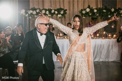 Indian bride dancing with her father capture. Indian bride dancing with her father capture.