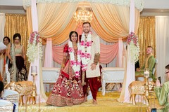See this lovely Indian couple at their jaimala ritual. See this lovely Indian couple at their jaimala ritual.