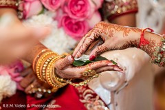 Indian bride holding the ceremony ritual leaf. Indian bride holding the ceremony ritual leaf.