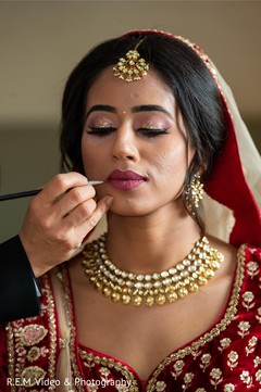 Maharani getting her lipstick on. Maharani getting her lipstick on.