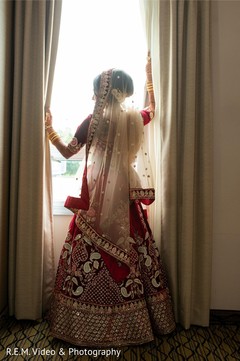 Lovely Indian bride looking out the window. Lovely Indian bride looking out the window.