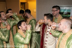 Indian groom with groomsmen having a toast. Indian groom with groomsmen having a toast.