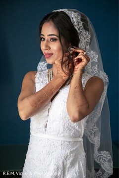 Indian bride getting her earings on. Indian bride getting her earings on.