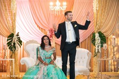 Indian newlyweds enjoying their reception party. Indian newlyweds enjoying their reception party.