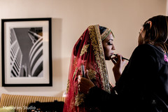Lovely bride getting her makeup done Lovely bride getting her makeup done