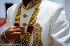 Indian groom wearing the sherwani. Indian groom wearing the sherwani.