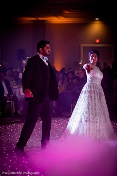 Indian lovebirds having their first dance Indian lovebirds having their first dance