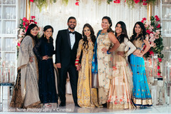 Couple posing with special guests. Couple posing with special guests.