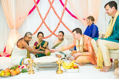 Indian groom taking the coconut during the ceremony. Indian groom taking the coconut during the ceremony.