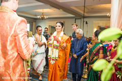 Indian couple exchanging garlands. Indian couple exchanging garlands.