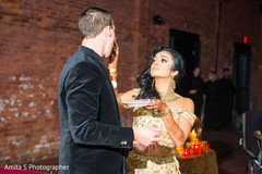 Maharani giving her groom a taste of the wedding cake. Maharani giving her groom a taste of the wedding cake.