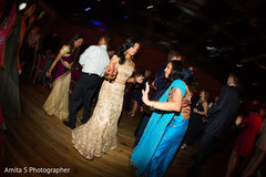 Maharani dancing with some guests. Maharani dancing with some guests.