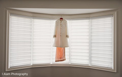 Indian groom's sherwani hanging. Indian groom's sherwani hanging.