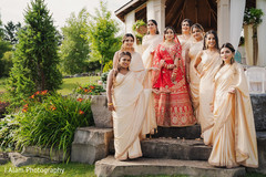 Indian bride posing with bridesmaids. Indian bride posing with bridesmaids.