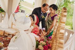 Indian bride and groom during the ceremony. Indian bride and groom during the ceremony.
