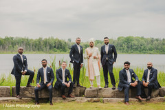 Groom with groomsmen posing. Groom with groomsmen posing.