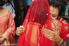 Indian bride with special guest having an emotional moment. Indian bride with special guest having an emotional moment.