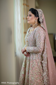 Adorable indian bride looking out the window Adorable indian bride looking out the window