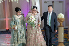 Indian bride's grand entrance to wedding ceremony Indian bride's grand entrance to wedding ceremony