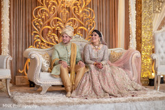Indian couple having a great time at their wedding ceremony Indian couple having a great time at their wedding ceremony