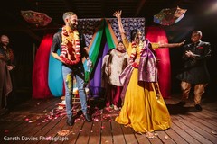Joyful India couple at their haldi party. Joyful India couple at their haldi party.