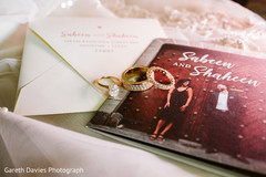 Incredible Indian wedding invitation and wedding rings. Incredible Indian wedding invitation and wedding rings.