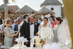 Indian bride and groom at their wedding ceremony. Indian bride and groom at their wedding ceremony.