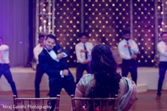 Indian groom dancing for his Maharani. Indian groom dancing for his Maharani.