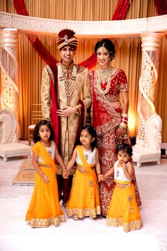 Enchanting indian couple with family relatives. Enchanting indian couple with family relatives.