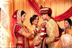 Traditional Indian bride and groom's jaimala ceremony. Traditional Indian bride and groom's jaimala ceremony.