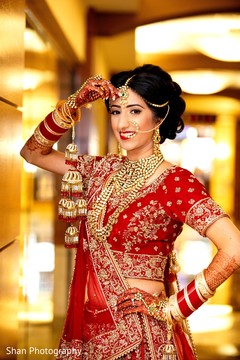 Ravishing indian bride on her ceremony lehenga. Ravishing indian bride on her ceremony lehenga.