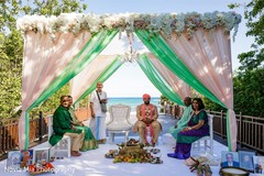 Indian groom being welcome to mandap. Indian groom being welcome to mandap.