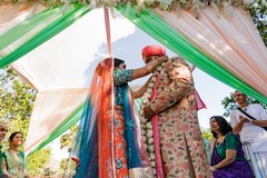 Sweet Indian bride putting garland to groom. Sweet Indian bride putting garland to groom.