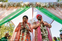 Traditional Indian bride and groom's jaimala ceremony. Traditional Indian bride and groom's jaimala ceremony.